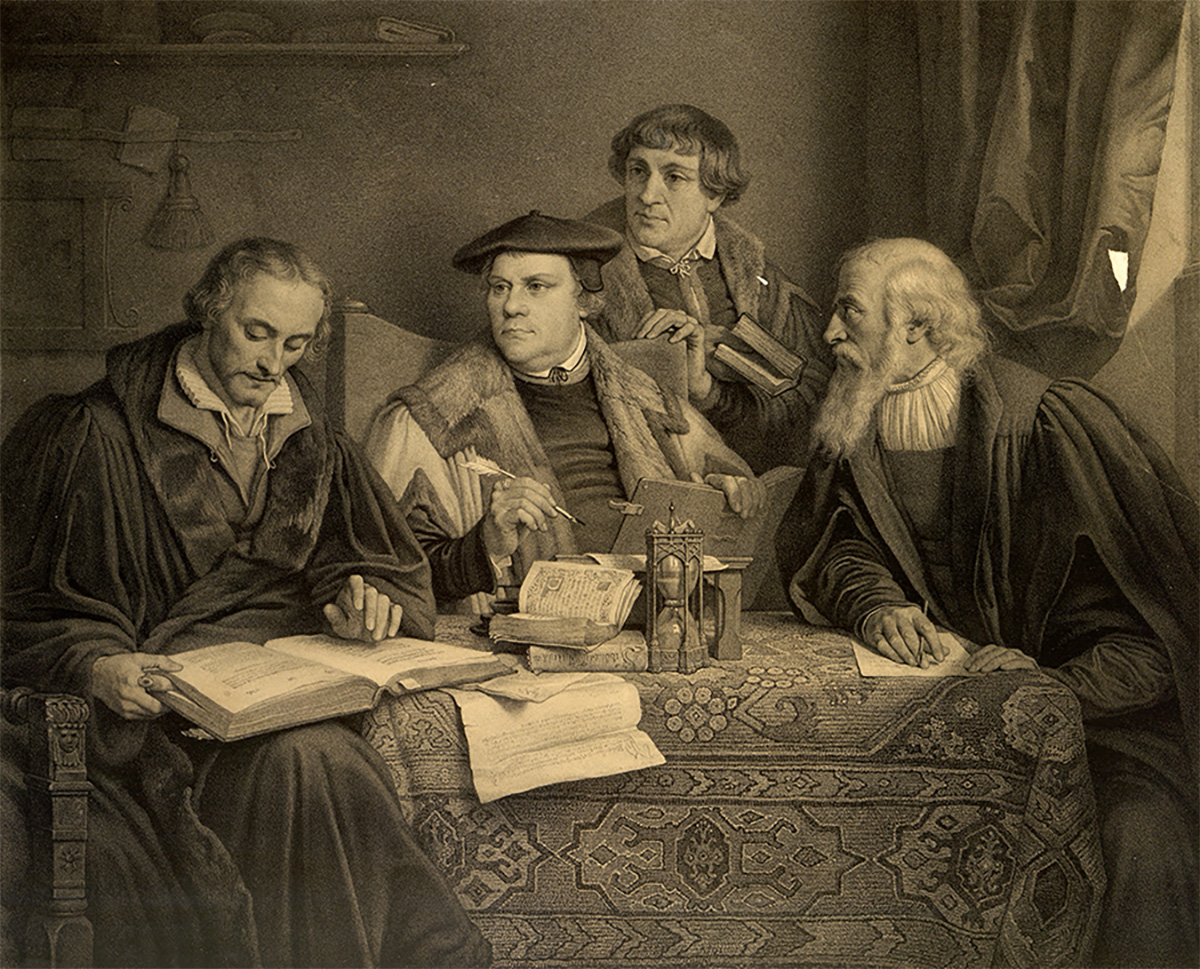 Philipp Melanchthon (left), Martin Luther (center), Johann Bugenhagen (aka Pomeranus, second from right), and Caspar Cruciger (right) translate the Bible. Lithograph by Alphonse Léon Noël from a painting by Pierre-Antoine Labouchère, ca. 1846. [Image no. 4433]