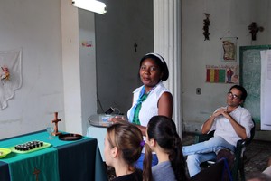 Co-founders of the Camagüey Mission: Kenie Suarez (standing) and her husband, Reinier Rodriguez (seated behind her).