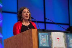 Monica Hall (Utah), vice moderator of Committee 13, BOP, PILP, PPC and Foundation reports in plenary at the 221st General Assembly (2014) of the PC(USA) in Detroit, MI on Wednesday, June 18, 2014. 