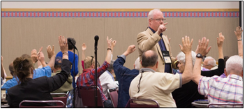 Forrest Claassen counts votes in the Committee on Ecumenical and Interfaith Relations.