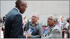 J. Herbert Nelson greets commissioners.  