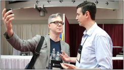 David Baker (right) talks with Landon Whitsitt (left). Photo: Danny Bolin