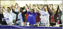 Commissioners stand together on Mission T-shirt Day. 