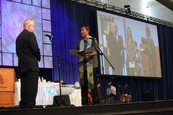 GA 220 Moderator Neal Presa asks the constitutional questions of Gradye Parsons during his installation as Stated Clerk of the General Assembly. 