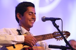 man playing a ukelele