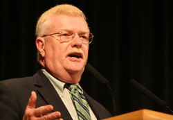 Gradye Parsons at a podium