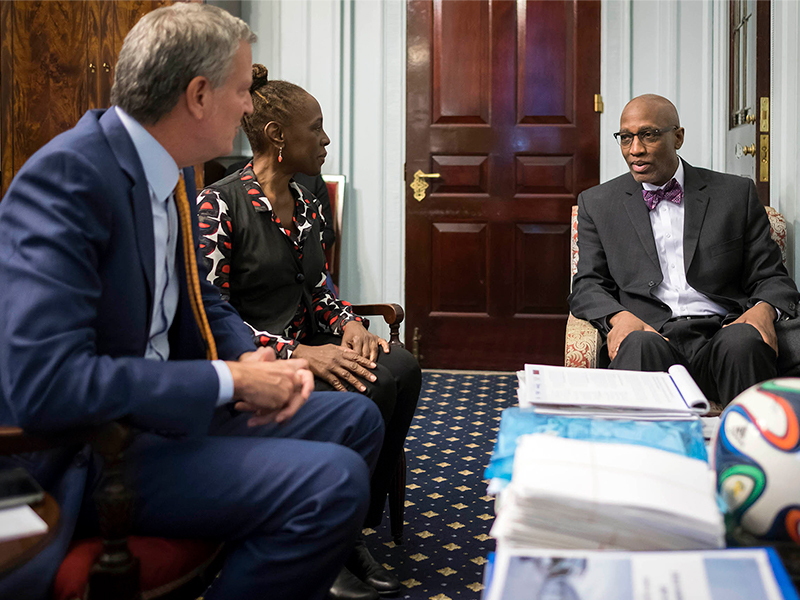 The Reverend Dr. J. Herbert Nelson, II, spends time with Mayor Bill de Blasio and his wife Chirlane McCray during a recent visit. Photo provided.