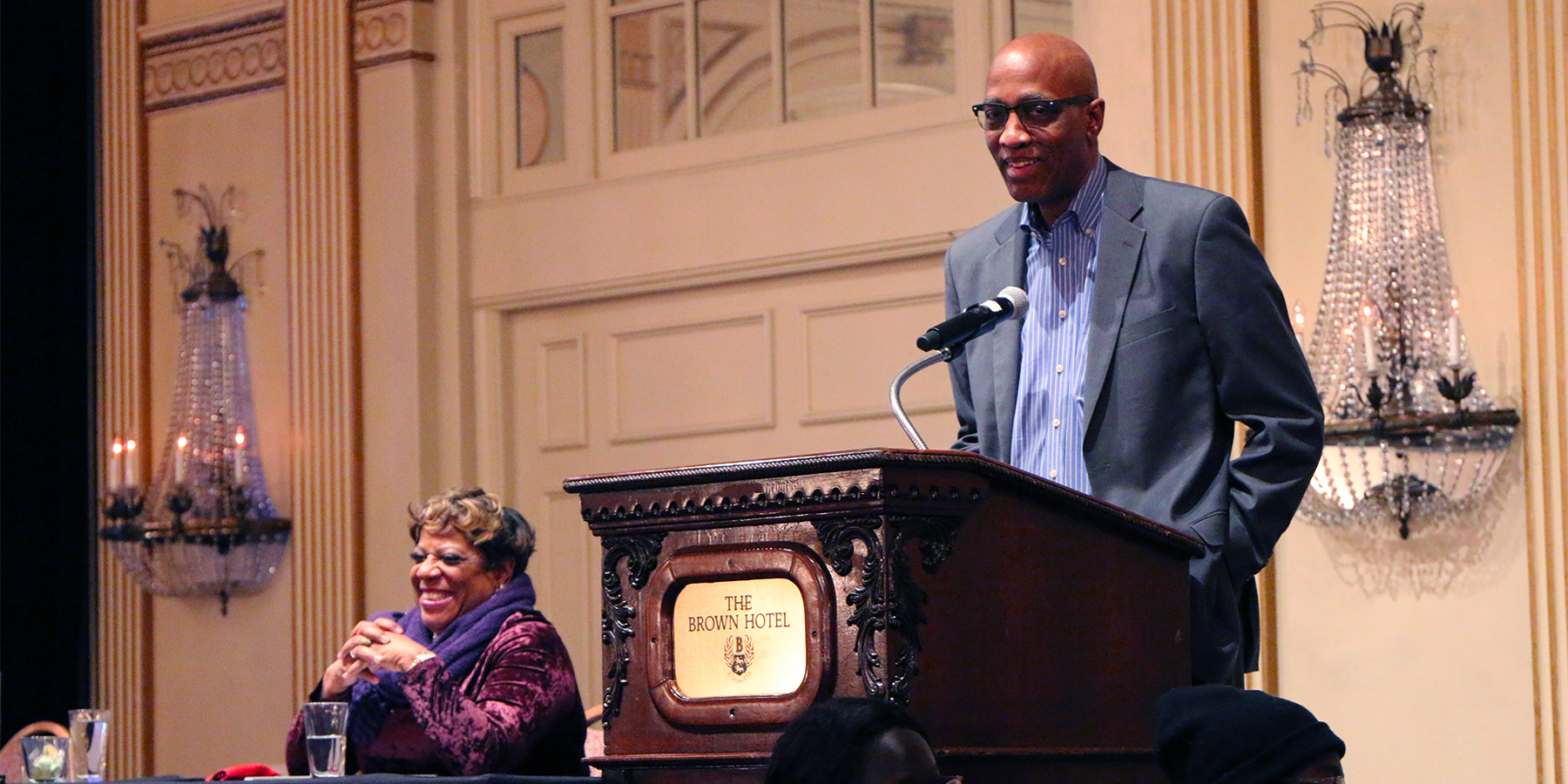 The Rev. Dr. J. Herbert Nelson, II, Stated Clerk of the General Assembly, speaks to mid council moderators Saturday in Louisville, Ky. Sharing a light moment with Nelson is the Rev. Dr. Diane Moffett, president and executive director of the Presbyterian Mission Agency. Photo by Rick Jones.