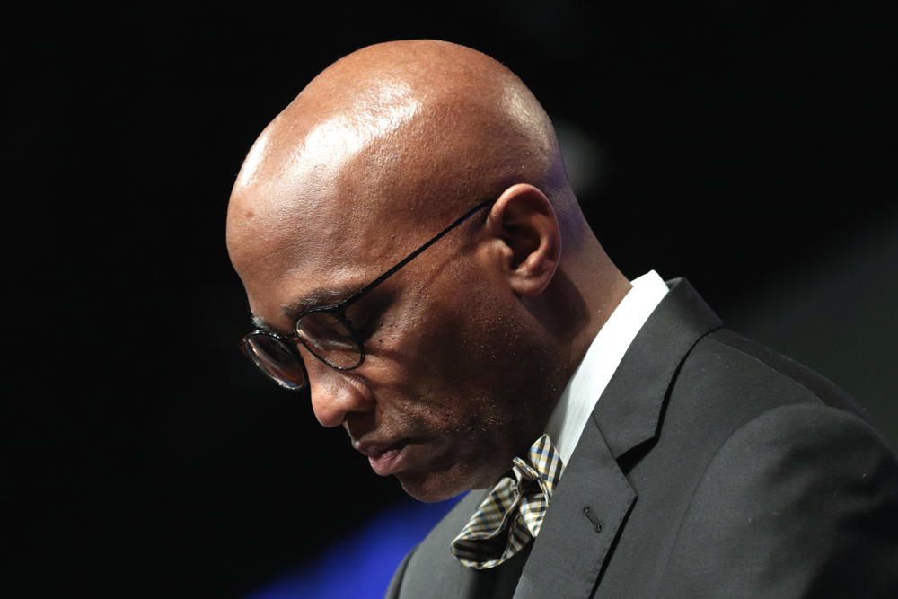 Stated Clerk J. Herbert Nelson bows his head for prayer at the 223rd General Assembly (2018) in St. Louis. Photo by Danny Bolin.