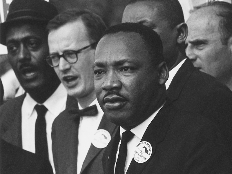 Civil Rights March on Washington, D.C. - Martin Luther King, Jr. in a crowd. From the National Archives - Public Domain. 