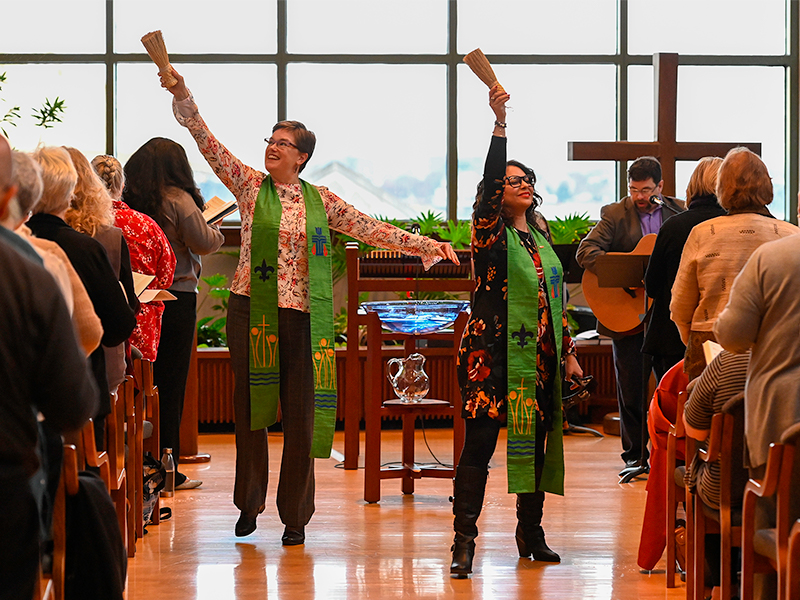 Co-Moderators of the 223rd General Assembly of the PC(USA), Ruling Elder Vilmarie Cintrón-Olivieri and Reverend Cindy Kohlmann, hosts of the Moderators' Conference lead worship at the Presbyterian Center in Louisville, Kentucky. Photo by Rich Copley