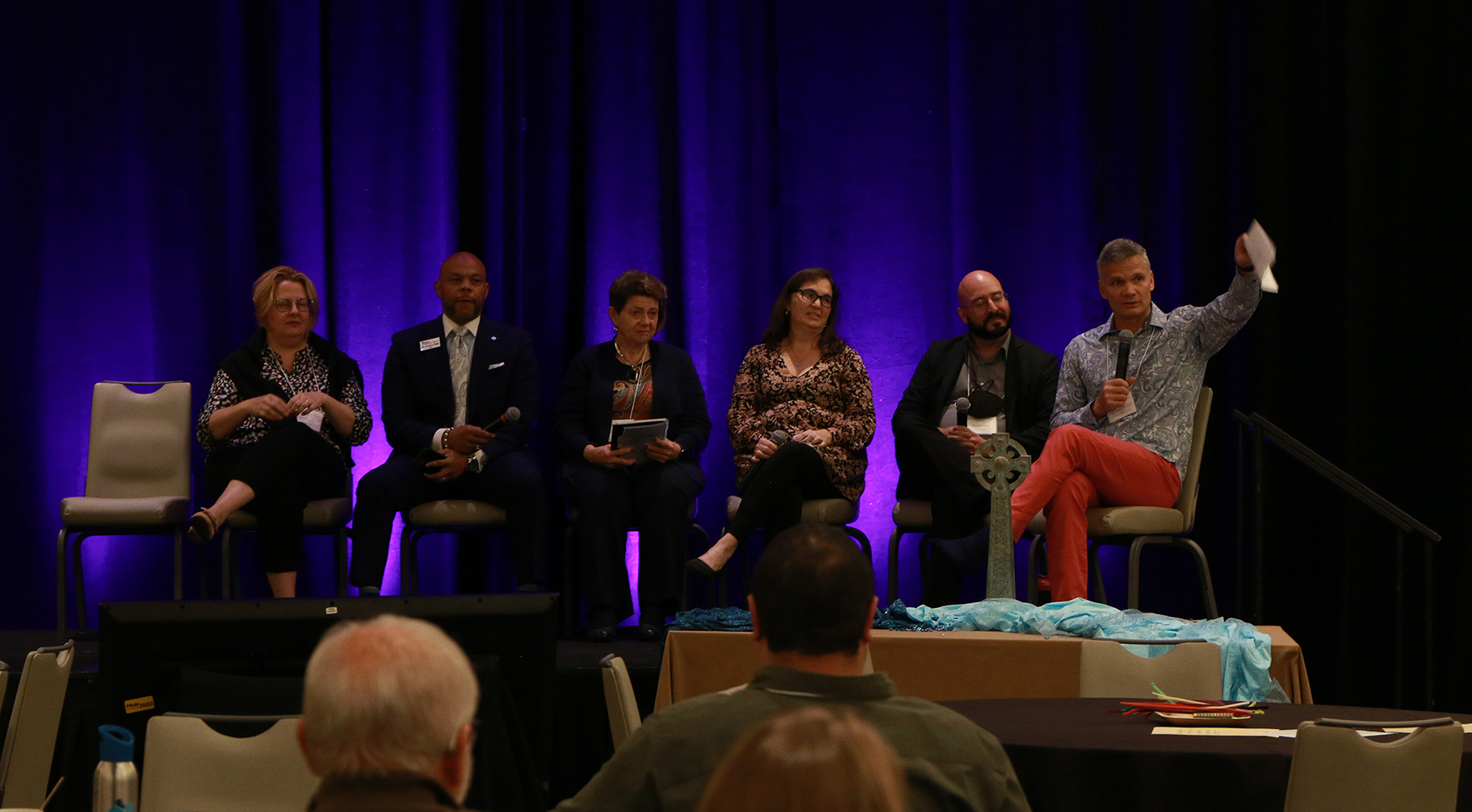 Dr. Corey Schlosser-Hall, at right, moderated a panel that included, left to right, the Rev. Liz Kanera, the Rev. Cedric Portis Sr., the Rev. Linda Culbertson, the Rev. Heidi Worthen Gamble and the Rev. Ryan Landino. (Photo by Randy Hobson) 