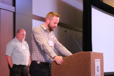 Rev. Jonathan Reinink leads prayer at the Mid Council Leaders Gathering in Chicago, commemorating the beating of Matthew Shepard. 