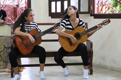 Spanish guitar is one of the musical genres taught in the youth music program at the Toyos Mission.