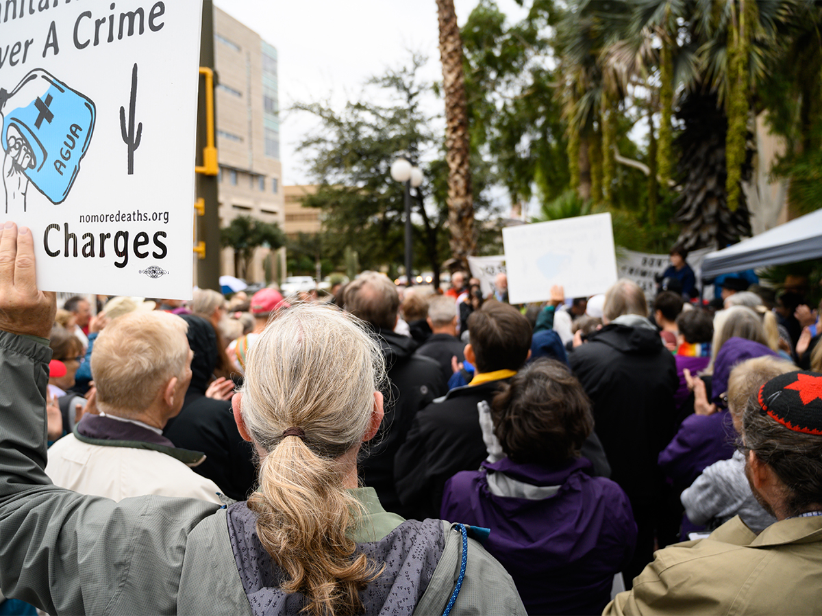 Supporters of Scott Warren march outside of a Tucson courthouse awaiting a verdict. Photo by Gregg Brekke. 