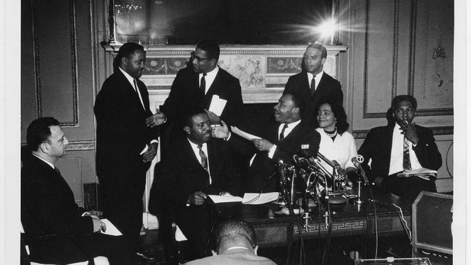 Gayraud Wilmore at a press conference with SCLC leaders Hosea Williams; Martin Luther King, Jr.; Coretta Scott King; and Andrew Young. [Pearl ID: 7202]